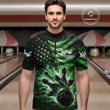 Load image into Gallery viewer, Male model wearing a black bowling quarter-zip shirt at the bowling lane with green flame bowling graphics and patriotic details.