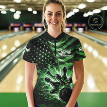 Load image into Gallery viewer, Female model wearing a black bowling quarter-zip shirt at the bowling lane with a green flame bowling ball striking pins and distressed American flag artwork.