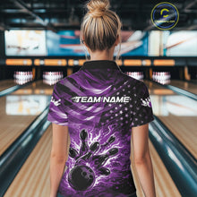 Load image into Gallery viewer, Back view of a female model in a black bowling polo shirt featuring a purple flame bowling ball striking pins with distressed American flag artwork.