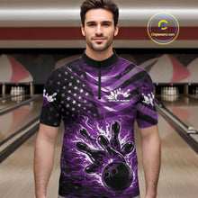 Load image into Gallery viewer, Male model wearing a black bowling quarter-zip shirt at the lane with purple flame bowling artwork and flag-inspired accents.