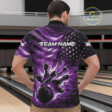 Load image into Gallery viewer, Front view of a male model in a black bowling quarter-zip shirt featuring purple flame strike graphics and distressed flag motifs.