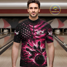 Load image into Gallery viewer, Male model wearing a black bowling quarter-zip shirt at the bowling lane with pink flame bowling graphics and patriotic flag accents.