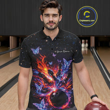 Load image into Gallery viewer, Male model wearing a black bowling polo shirt at the lane with a fiery bowling strike scene and glowing butterflies.