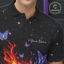 Load image into Gallery viewer, Left chest close-up of a black bowling polo shirt featuring a flaming bowling ball and glowing butterfly graphics.