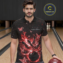 Load image into Gallery viewer, Male model in a black and red bowling polo shirt at the bowling lane with fiery strike artwork and glowing butterflies.