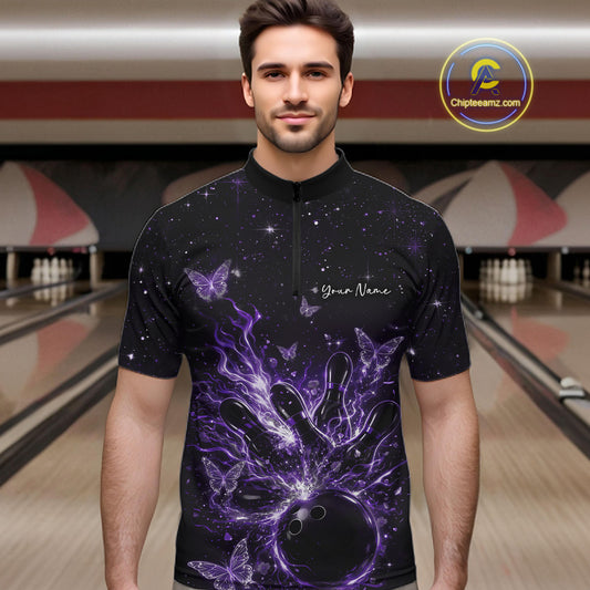 Male model in a black and purple bowling quarter-zip shirt at the lane with cosmic bowling strike graphics.