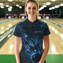 Load image into Gallery viewer, Female model wearing a black and blue bowling quarter-zip shirt featuring glowing butterfly accents and bowling graphics inside a bowling center.
