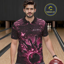 Load image into Gallery viewer, Male model in a black and pink bowling polo shirt at the lane with luminous butterfly bowling graphics.