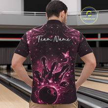 Load image into Gallery viewer, Front view of a male model wearing a black and pink quarter-zip shirt with glowing bowling ball artwork.