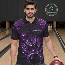 Load image into Gallery viewer, Male model wearing a black and purple bowling polo shirt at the lane with glowing butterfly bowling artwork.
