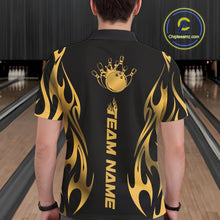 Load image into Gallery viewer, Male model seen from the back in a bowling lane wearing a black polo shirt featuring a golden metal tribal flame bowling ball striking pins in a powerful sports illustration.