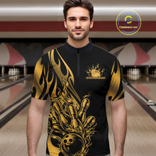 Load image into Gallery viewer, Male model front view in bowling venue wearing black quarter zip shirt with golden metal tribal flame bowling ball striking pins in powerful sports design.