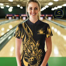 Load image into Gallery viewer, Female model front view in bowling lane wearing black quarter zip shirt with golden metal tribal flame bowling ball hitting pins illustration