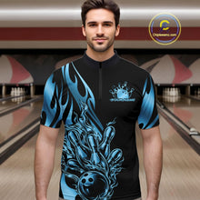 Load image into Gallery viewer, Male model front view inside bowling center wearing black quarter zip with blue gradient tribal flame bowling ball hitting pins in energetic action scene.