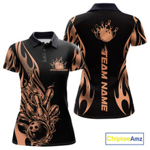 Load image into Gallery viewer, Front and back mockup of women’s black polo shirt featuring rose gold gradient tribal flame bowling ball striking pins in premium athletic style.