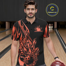Load image into Gallery viewer, Male model seen from the front in a bowling lane wearing a black polo shirt featuring a red gradient tribal flame bowling ball striking pins in a dynamic action scene.