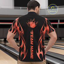 Load image into Gallery viewer, At the bowling venue, front view male model wearing a black quarter zip featuring red gradient tribal flame artwork with a bowling ball hitting pins in motion.