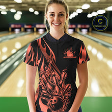Load image into Gallery viewer, Female model front view in bowling alley wearing black quarter zip shirt with red gradient tribal flame bowling ball striking pins dynamic artwork
