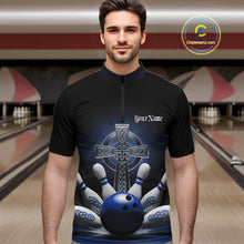 Load image into Gallery viewer, Male model front view in bowling lane wearing black quarter zip shirt featuring blue Celtic cross and dynamic bowling strike artwork