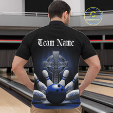 Load image into Gallery viewer, Male model front view at bowling venue wearing black quarter zip shirt with blue Celtic cross and bowling ball impact graphic in action scene