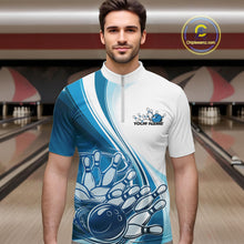 Load image into Gallery viewer, Male model in a bowling alley wearing a white and blue quarter zip shirt, showing a sweeping curve bowling ball striking pins design.