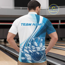 Load image into Gallery viewer, Male model in a bowling lane wearing a white and blue quarter zip shirt, featuring a dynamic bowling strike illustration with curved motion graphics.