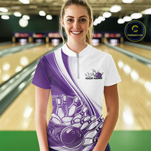 Load image into Gallery viewer, Female model wearing a white and purple bowling quarter zip featuring sweeping curve accents and a bowling ball crashing into pins graphic inside a bowling alley.