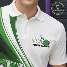 Load image into Gallery viewer, Close-up of the left chest area of a white and green bowling polo shirt, featuring a dynamic curved bowling strike design.