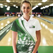 Load image into Gallery viewer, Female model in a bowling alley wearing a white and green polo shirt with dynamic curved bowling strike artwork and motion accents.
