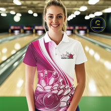 Load image into Gallery viewer, Female model in a bowling lane wearing a white and pink polo shirt with a sweeping curve bowling strike graphic and pins being knocked down.
