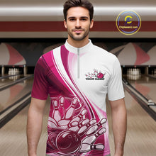 Load image into Gallery viewer, Male model in a bowling lane wearing a white and pink quarter zip shirt, showcasing a sweeping curve graphic with a bowling ball knocking down pins.
