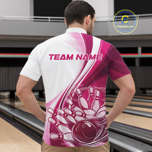 Load image into Gallery viewer, Male model in a bowling lane wearing a white and pink quarter zip bowling shirt, featuring a dynamic sweeping curve graphic with a bowling ball crashing into pins.
