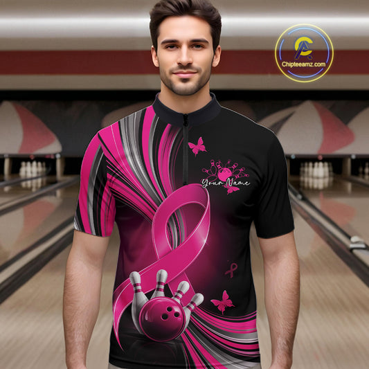 Male model wearing a black and pink bowling quarter zip with breast cancer awareness ribbons, small butterflies, and bowling graphics, front view