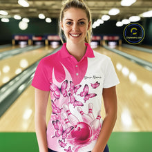 Load image into Gallery viewer, Female model wearing a white and pink bowling polo shirt with butterfly accents and bowling graphics at the bowling lane.