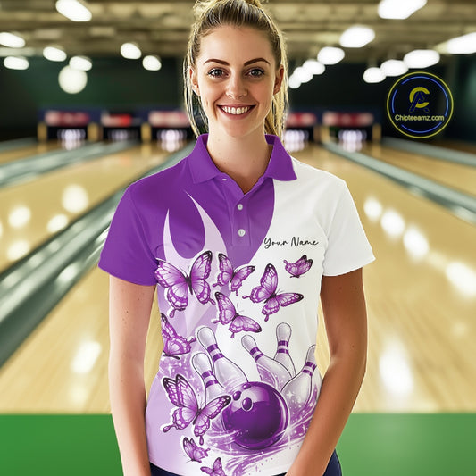 Front view of a female model in a white and purple bowling polo with butterfly artwork and bowling graphics