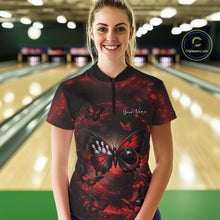 Load image into Gallery viewer, Female model shown from the front in a bowling center wearing a quarter-zip shirt with a red and black butterfly and bowling ball body artwork.