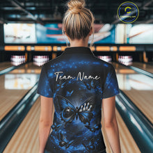 Load image into Gallery viewer, Back view of a female model wearing a bowling quarter-zip shirt with a blue and black butterfly motif and smoky background graphics.