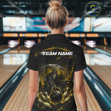 Load image into Gallery viewer, Back view of a female model wearing a black and yellow bowling quarter zip shirt showcasing a grim reaper with a blazing bowling ball striking scattered pins amid swirling flames in a bowling lane.