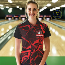Load image into Gallery viewer, Female model wearing a black and red bowling polo at the bowling lane with sharp geometric graphics.