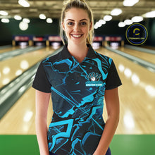 Load image into Gallery viewer, Female model in a bowling alley wearing a black and blue polo with angular cracked pattern graphics.