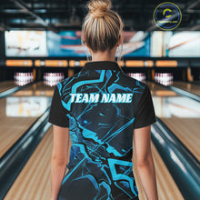 Load image into Gallery viewer, Back view of a womens black and blue bowling polo displaying futuristic geometric linework.
