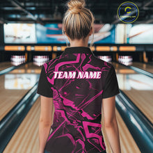 Load image into Gallery viewer, Back view of a black and pink bowling quarter-zip displaying a futuristic geometric pattern with sharp line details.
