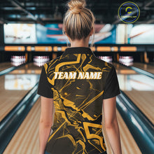 Load image into Gallery viewer, Back view of a womens black and yellow bowling quarter-zip showcasing a cracked geometric pattern and angular lines.