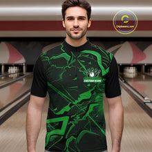 Load image into Gallery viewer, Male model wearing a black and green quarter-zip in a bowling lane with sharp cracked geometric artwork.