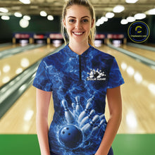 Load image into Gallery viewer, Female model wearing a blue-themed bowling quarter-zip at the bowling lane with flame-accented bowling graphics.