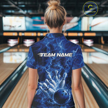 Load image into Gallery viewer, Back view of a womens bowling quarter-zip featuring a blue bowling ball striking pins with dramatic flame artwork.