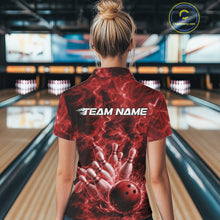 Load image into Gallery viewer, Back view of a womens bowling quarter-zip displaying a red bowling ball hitting pins against a flame background.
