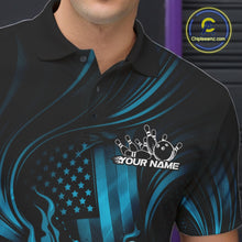 Load image into Gallery viewer, Close-up of a black and turquoise blue bowling polo shirt left chest showcasing patriotic flames and bowling strike design.