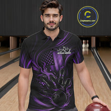 Load image into Gallery viewer, Male model wearing a black and purple bowling polo shirt at a bowling lane with fiery bowling strike graphics and patriotic styling.