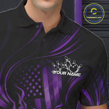 Load image into Gallery viewer, Close-up of a black and purple bowling polo shirt left chest showing patriotic flames and bowling ball striking pins design.
